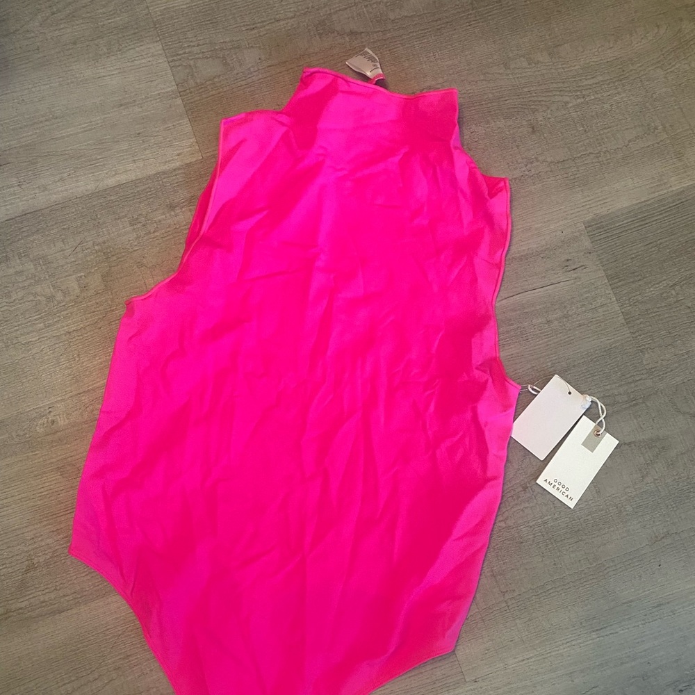 Brand new neon pink seamless bodysuit